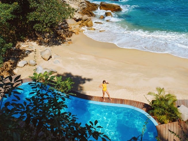 Pool by a beach and ocean