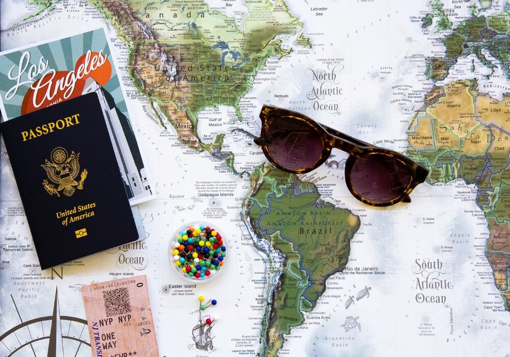 passport lenses and world map