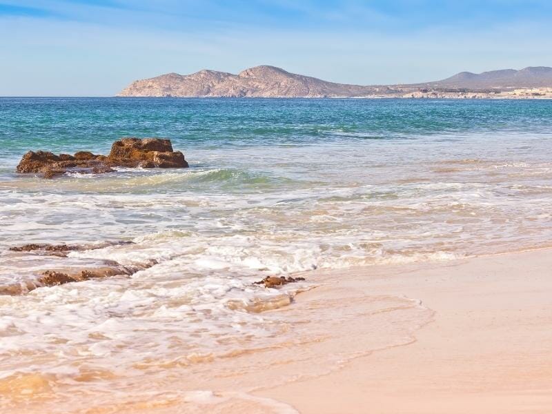 beach and mountain range in Cabo San Lucas