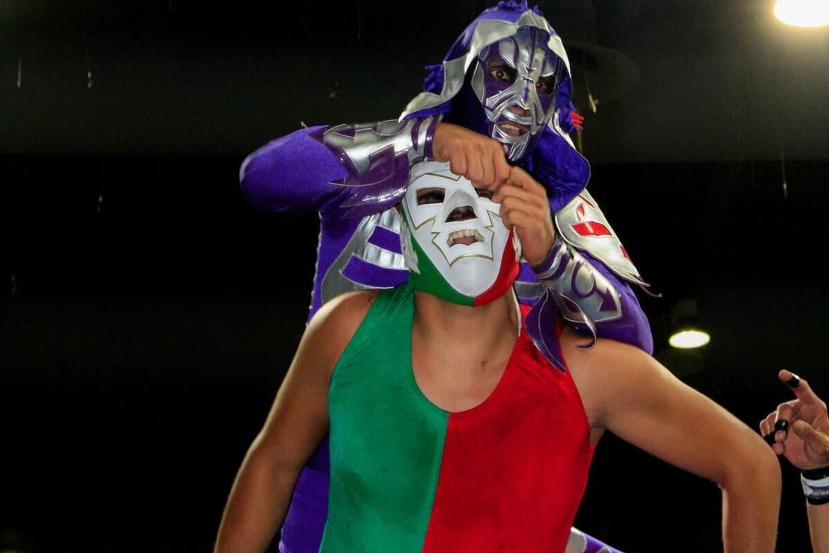 One of the best Mexico City Lucha Libre tours in Mexico with fighters fighting.